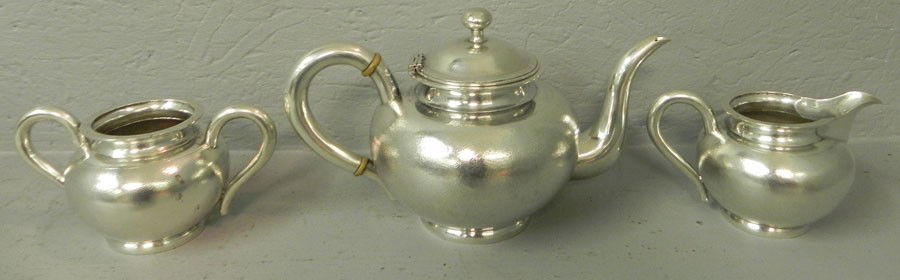 (3) piece Chinese export silver tea set.: (3) piece Chinese export silver tea set. Late 19th century. 33.66 troy oz.