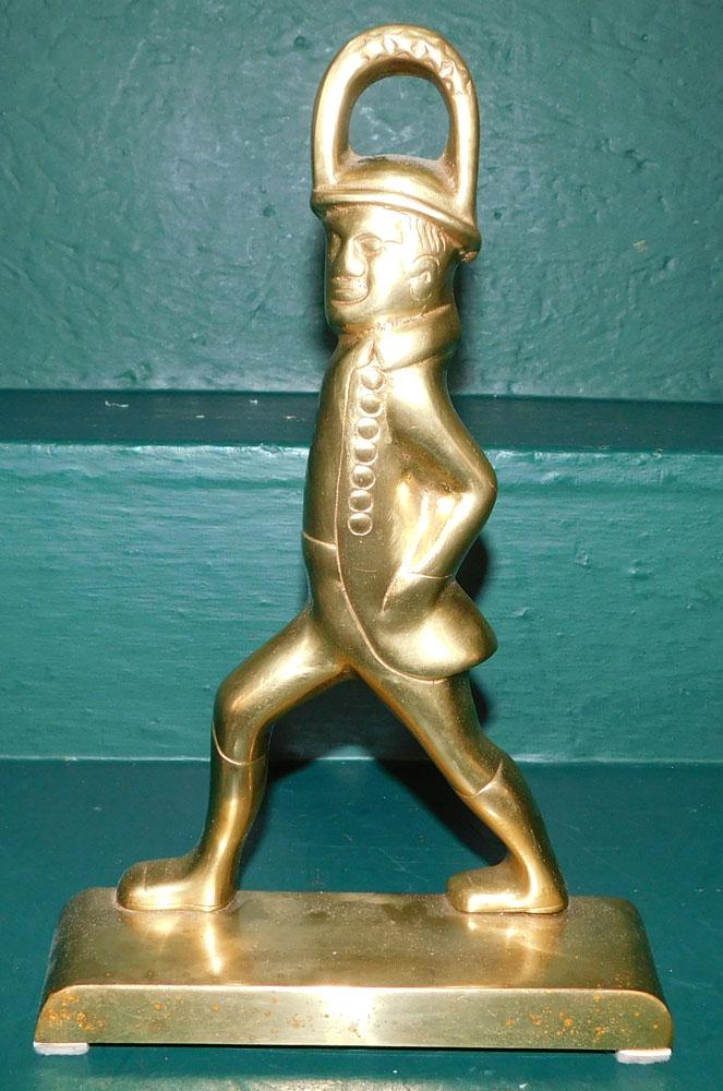 Brass Hessian Soldier Door Stop by VA Metalcrafters: Brass Hessian Soldier Door Stop by VA Metalcrafters . 11 3/4" H ALL DESCRIPTIONS AND ANY CONDITION STATEMENT GIVEN BY LANGSTON AUCTION GALLERY ARE STRICTLY AN OPINION AND LANGSTON'S SHALL HAVE NO RESP