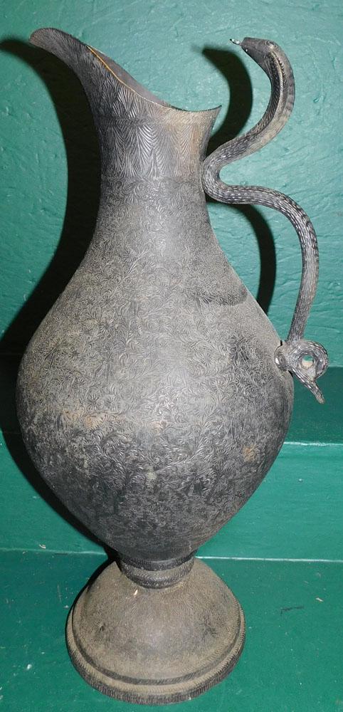 Bronze Ewer with Cobra Handle: Bronze Ewer with Cobra Handle . 21 1/2" H ALL DESCRIPTIONS AND ANY CONDITION STATEMENT GIVEN BY LANGSTON AUCTION GALLERY ARE STRICTLY AN OPINION AND LANGSTON'S SHALL HAVE NO RESPONSIBILITY FOR ERRORS