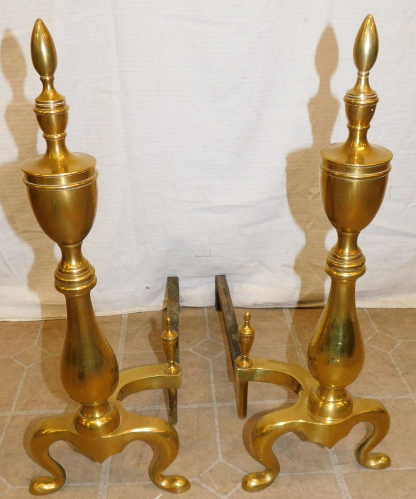 Pair of Brass Andirons: Pair of Brass Andirons. 21 1/4" H ALL DESCRIPTIONS AND ANY CONDITION STATEMENT GIVEN BY LANGSTON AUCTION GALLERY ARE STRICTLY AN OPINION AND LANGSTON'S SHALL HAVE NO RESPONSIBILITY FOR ERRORS OR OMISS