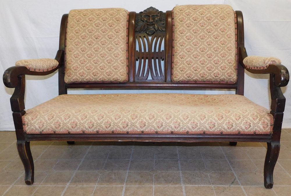 Carved Mahogany Victorian Loveseat with Northwind Face Back (1 of 5)