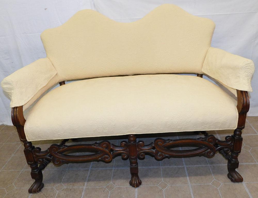 Antique Carved Mahogany Loveseat: Antique Carved Mahogany Loveseat. 49" W 29" D 36" H ALL DESCRIPTIONS AND ANY CONDITION STATEMENT GIVEN BY LANGSTON AUCTION GALLERY ARE STRICTLY AN OPINION AND LANGSTON'S SHALL HAVE NO RESPONSIBILITY F