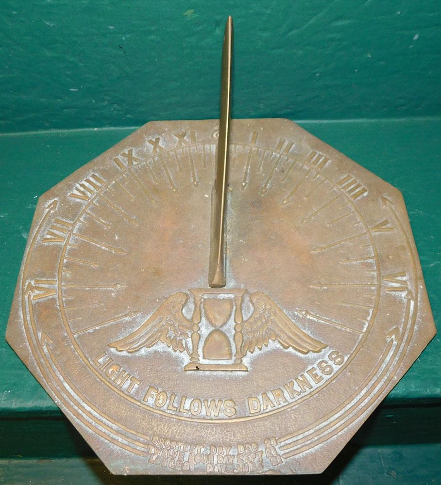 Brass Sun Dial: Brass Sun Dial. 10 1/2" Dia. ALL DESCRIPTIONS AND ANY CONDITION STATEMENT GIVEN BY LANGSTON AUCTION GALLERY ARE STRICTLY AN OPINION AND LANGSTON'S SHALL HAVE NO RESPONSIBILITY FOR ERRORS OR OMISSIONS.
