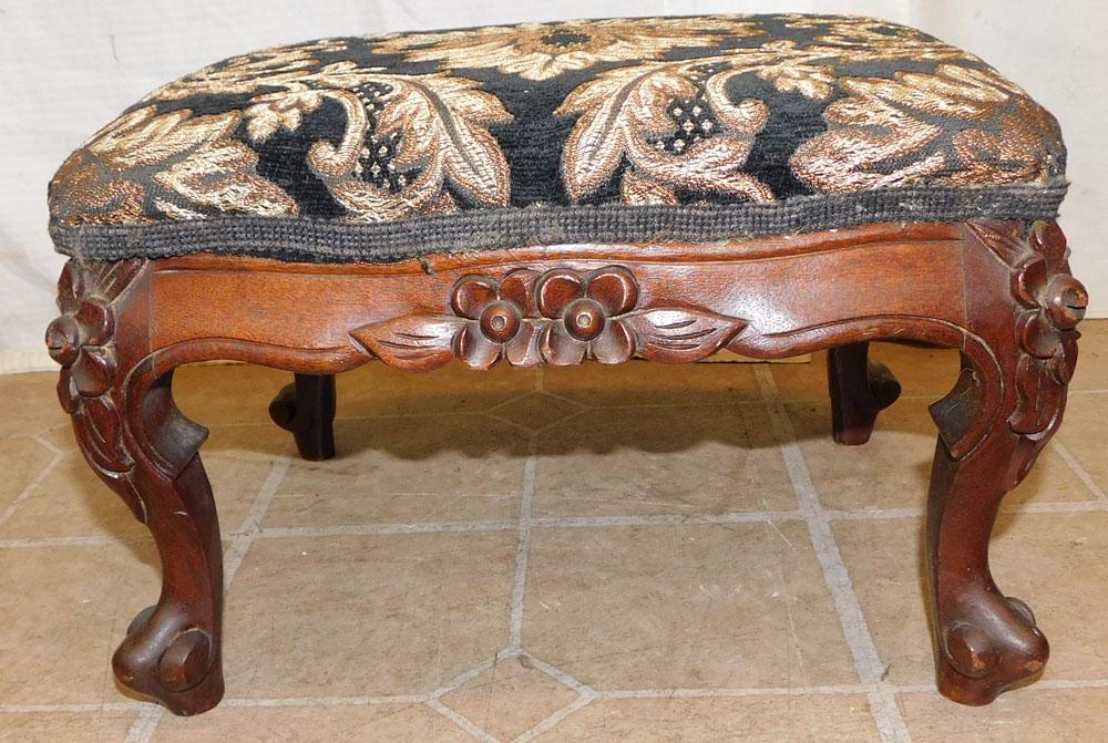 Carved Mahogany Foot Stool: Carved Mahogany Foot Stool. 15" W 12"D 9 3/4" H ALL DESCRIPTIONS AND ANY CONDITION STATEMENT GIVEN BY LANGSTON AUCTION GALLERY ARE STRICTLY AN OPINION AND LANGSTON'S SHALL HAVE NO RESPONSIBILITY FOR E
