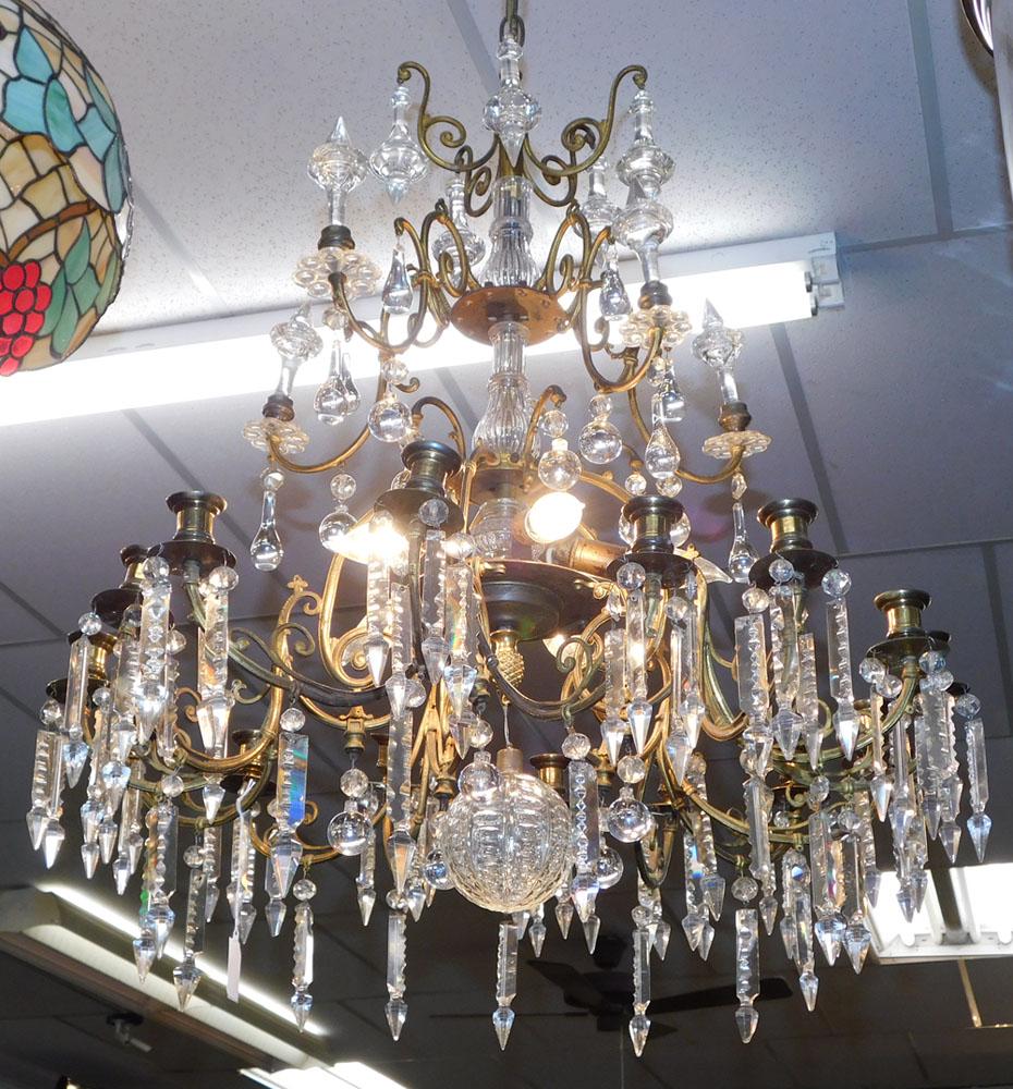Gilded Bronze & Glass 5 Light & 15 Candle Hole Chandelier with Prisms: Gilded Bronze & Glass 5 Light & 15 Candle Hole Chandelier with Prisms. 24" Dia. 32" H ALL DESCRIPTIONS AND ANY CONDITION STATEMENT GIVEN BY LANGSTON AUCTION GALLERY ARE STRICTLY AN OPINION AND LANGSTO