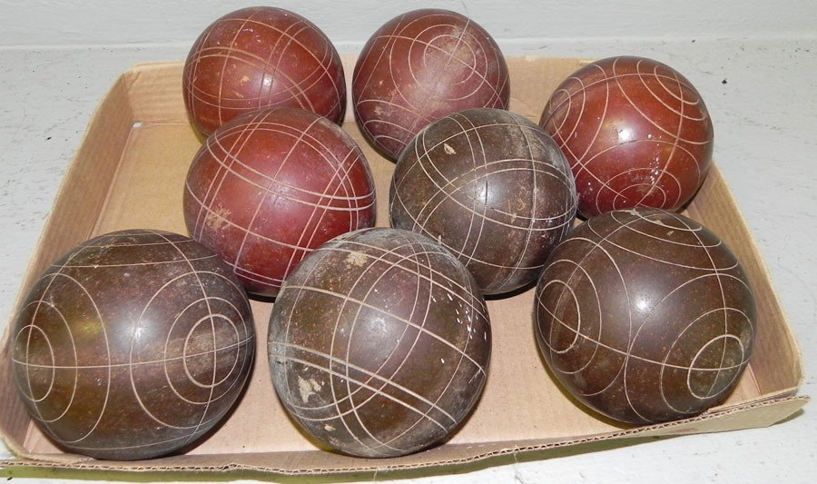 (8) wooden carved bocce balls.: (8) wooden carved bocce balls.