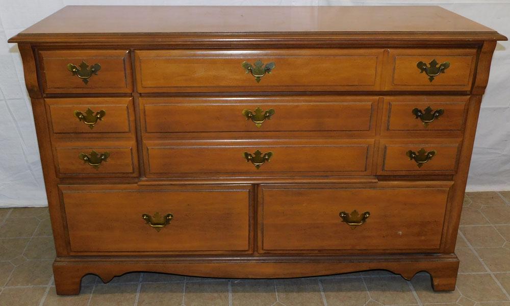 Maple 5 Drawer Dresser: Maple 5 Drawer Dresser. 52" W 19" D 34" H ALL DESCRIPTIONS AND ANY CONDITION STATEMENT GIVEN BY LANGSTON AUCTION GALLERY ARE STRICTLY OPINIONS AND LANGSTON'S SHALL HAVE NO RESPONSIBILITY FOR ERRORS OR