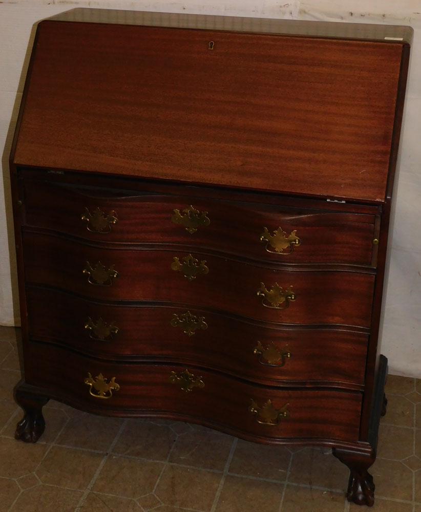 Mahogany Serpentine Front Desk: Mahogany Serpentine Front Desk. 34 1/2" W 17" D 42" H ALL DESCRIPTIONS AND ANY CONDITION STATEMENT GIVEN BY LANGSTON AUCTION GALLERY ARE STRICTLY OPINIONS AND LANGSTON'S SHALL HAVE NO RESPONSIBILITY F
