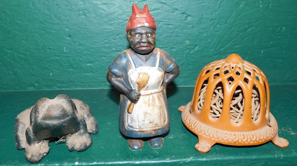 Cast Iron Frog, Cast Iron Mammy Bank, & Cast Iron String Winder: Cast Iron Frog, Cast Iron Mammy Bank, & Cast Iron String Winder. Up to 7" H ALL DESCRIPTIONS AND ANY CONDITION STATEMENT GIVEN BY LANGSTON AUCTION GALLERY ARE STRICTLY OPINIONS AND LANGSTON'S SHALL HA