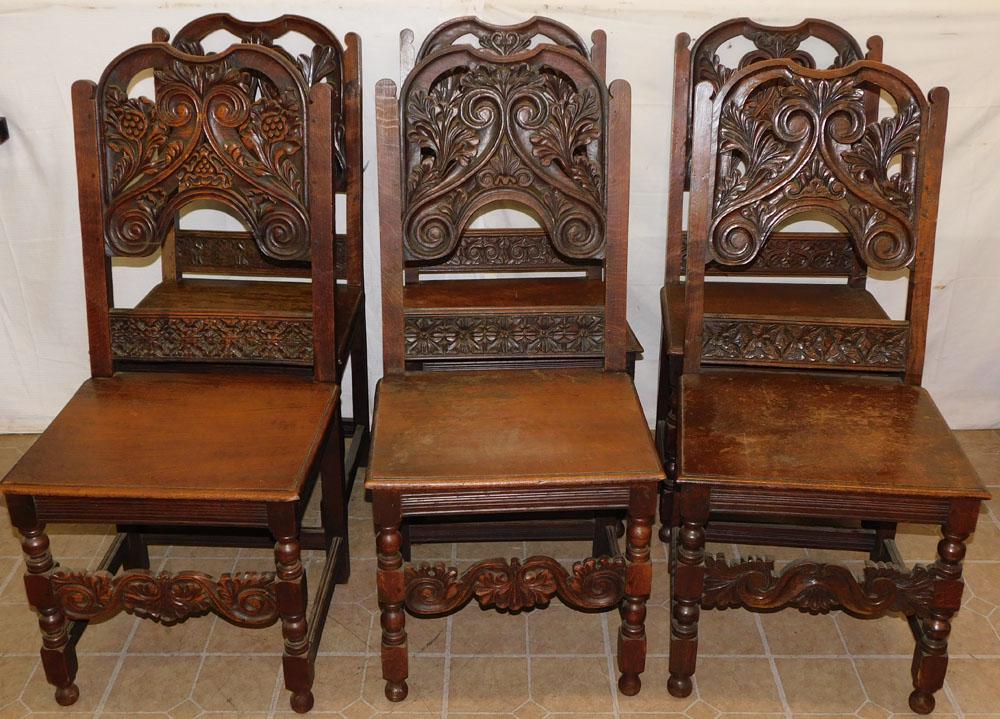 Set 6 Oak Carved Antique Dining Chairs: Set 6 Oak Carved Antique Dining Chairs. 42" H ALL DESCRIPTIONS AND ANY CONDITION STATEMENT GIVEN BY LANGSTON AUCTION GALLERY ARE STRICTLY OPINIONS AND LANGSTON'S SHALL HAVE NO RESPONSIBILITY FOR ERROR
