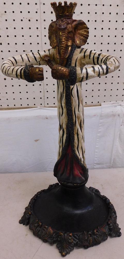 Painted Resin Umbrella Stand: Painted Resin Umbrella Stand . 24" H ALL DESCRIPTIONS AND ANY CONDITION STATEMENT GIVEN BY LANGSTON AUCTION GALLERY ARE STRICTLY OPINIONS AND LANGSTON'S SHALL HAVE NO RESPONSIBILITY FOR ERRORS OR OMIS