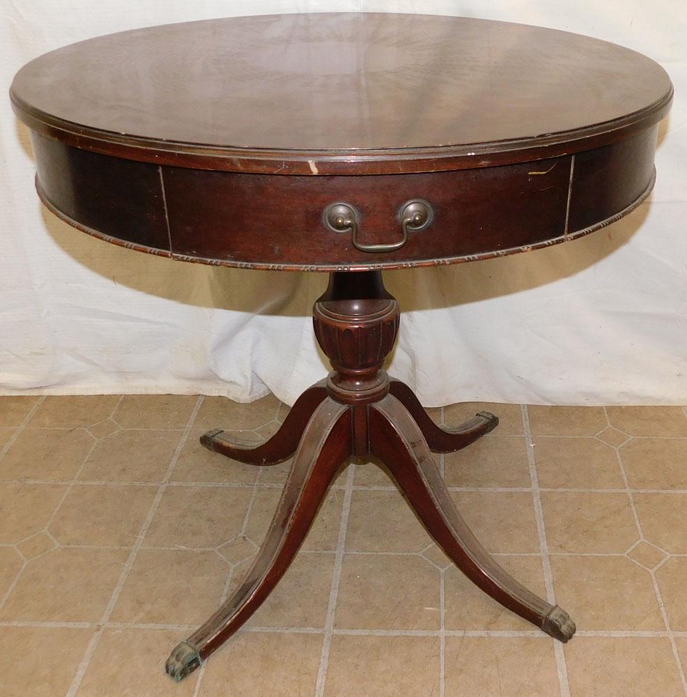 Mahogany Drum Table: Mahogany Drum Table . 29" Dia. 27 1/2" H ALL DESCRIPTIONS AND ANY CONDITION STATEMENT GIVEN BY LANGSTON AUCTION GALLERY ARE STRICTLY OPINIONS AND LANGSTON'S SHALL HAVE NO RESPONSIBILITY FOR ERRORS OR 