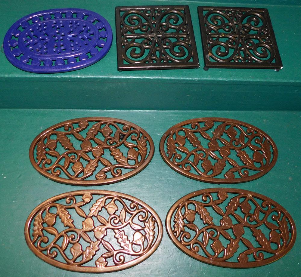 Lot of 7 Painted Cast Iron Trivets: Lot of 7 Painted Cast Iron Trivets. Up to 11 3/4" x 7" ALL DESCRIPTIONS AND ANY CONDITION STATEMENT GIVEN BY LANGSTON AUCTION GALLERY ARE STRICTLY OPINIONS AND LANGSTON'S SHALL HAVE NO RESPONSIBILITY
