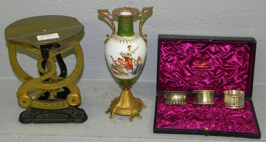 Set of scales, an urn & 3 silver plate napkin rings: Set of scales, an urn and (3) silver plate napkin rings.