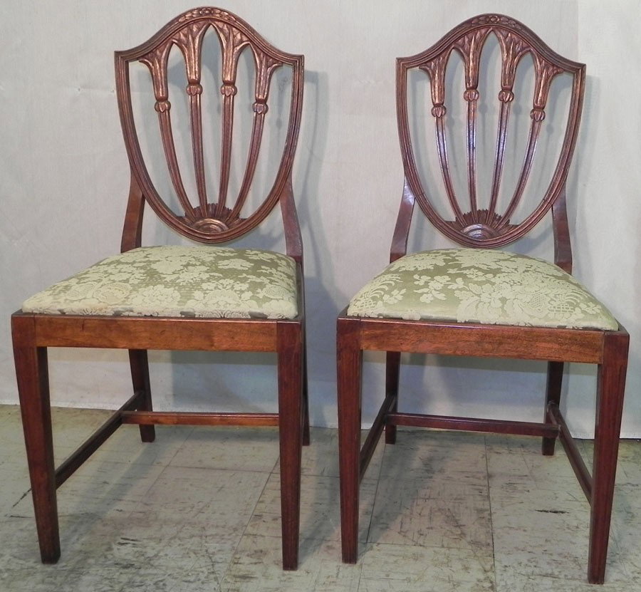 Pair of mahogany Hepplewhite chairs: Pair of mahogany Hepplewhite chairs circa 1810-1820.