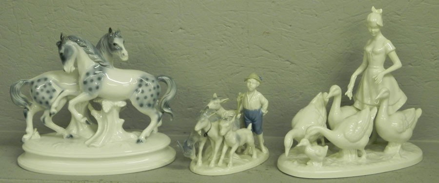 (3) Bavarian figurines: (3) Bavarian figurines, one is lady with geese, one is with horses, and boy with goat.