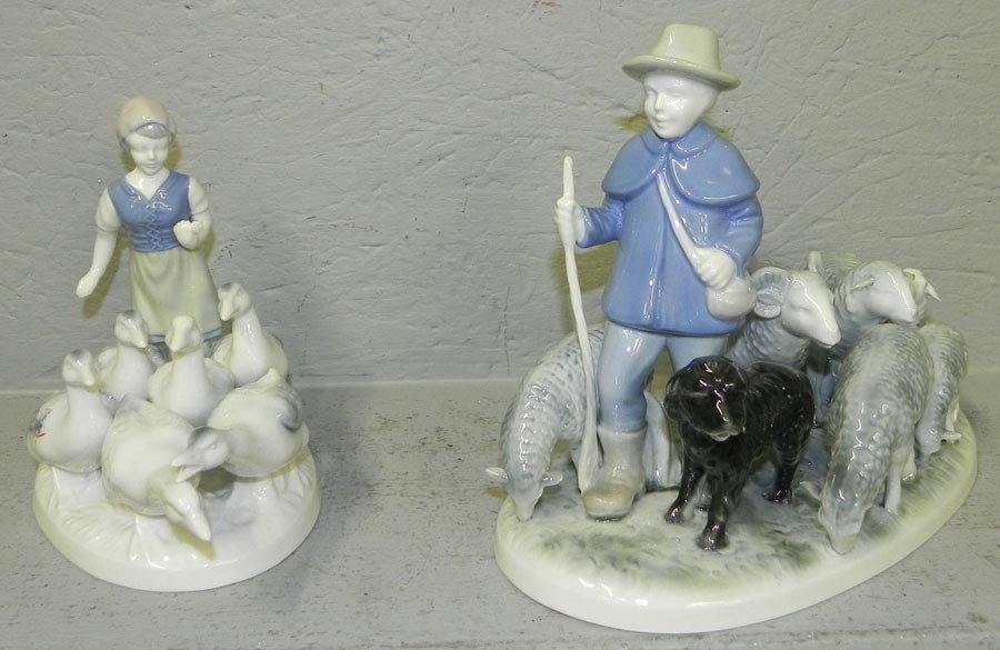 2 Bavarian figurines: Bavarian figurines, includes boy with sheep and lady with geese.