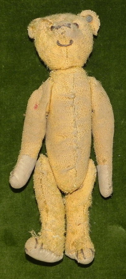 Early jointed teddy bear, Possibly Steiff.: Early jointed teddy bear, well loved. Possibly Steiff. 9" tall.
