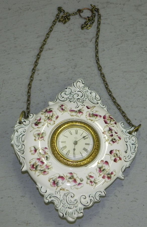 Porcelain Ansonia hanging wall clock.: Porcelain Ansonia hanging wall clock.