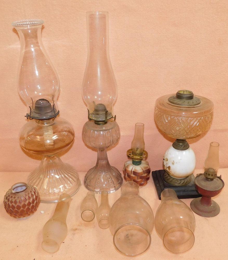 Lot Antique Oil Lamps: Lot Antique Oil Lamps. "ALL DESCRIPTIONS AND ANY CONDITION STATEMENT GIVEN BY LANGSTON AUCTION GALLERY ARE STRICTLY OPINIONS AND LANGSTON'S SHALL HAVE NO RESPONSIBILITY FOR ERRORS OR OMISSIONS. THE AB