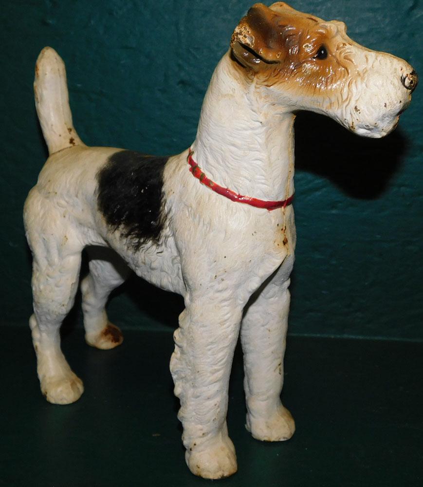 Painted Cast Iron Terrier Door Stop: Painted Cast Iron Terrier Door Stop. 10" H ALL DESCRIPTIONS AND ANY CONDITION STATEMENT GIVEN BY LANGSTON AUCTION GALLERY ARE STRICTLY OPINIONS AND LANGSTON'S SHALL HAVE NO RESPONSIBILITY FOR ERRORS O