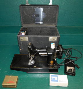 Vintage 221 Singer Featherweight Sewing Machine In Case: Vintage 221 Singer Featherweight Sewing Machine In Case. 14 1/2" W 8 1/2" D 11 1/2" H ALL DESCRIPTIONS AND ANY CONDITION STATEMENT GIVEN BY LANGSTON AUCTION GALLERY ARE STRICTLY OPINIONS AND LANGSTON'