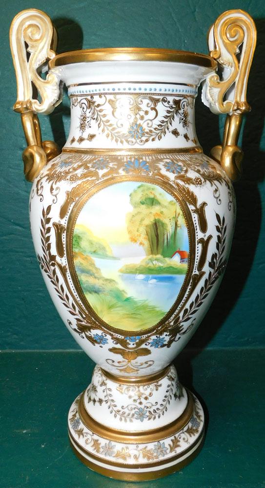 Painted Porcelain Nippon Two Handle Urn: Painted Porcelain Nippon Two Handle Urn. 15" H ALL DESCRIPTIONS AND ANY CONDITION STATEMENT GIVEN BY LANGSTON AUCTION GALLERY ARE STRICTLY OPINIONS AND LANGSTON'S SHALL HAVE NO RESPONSIBILITY FOR ERRO