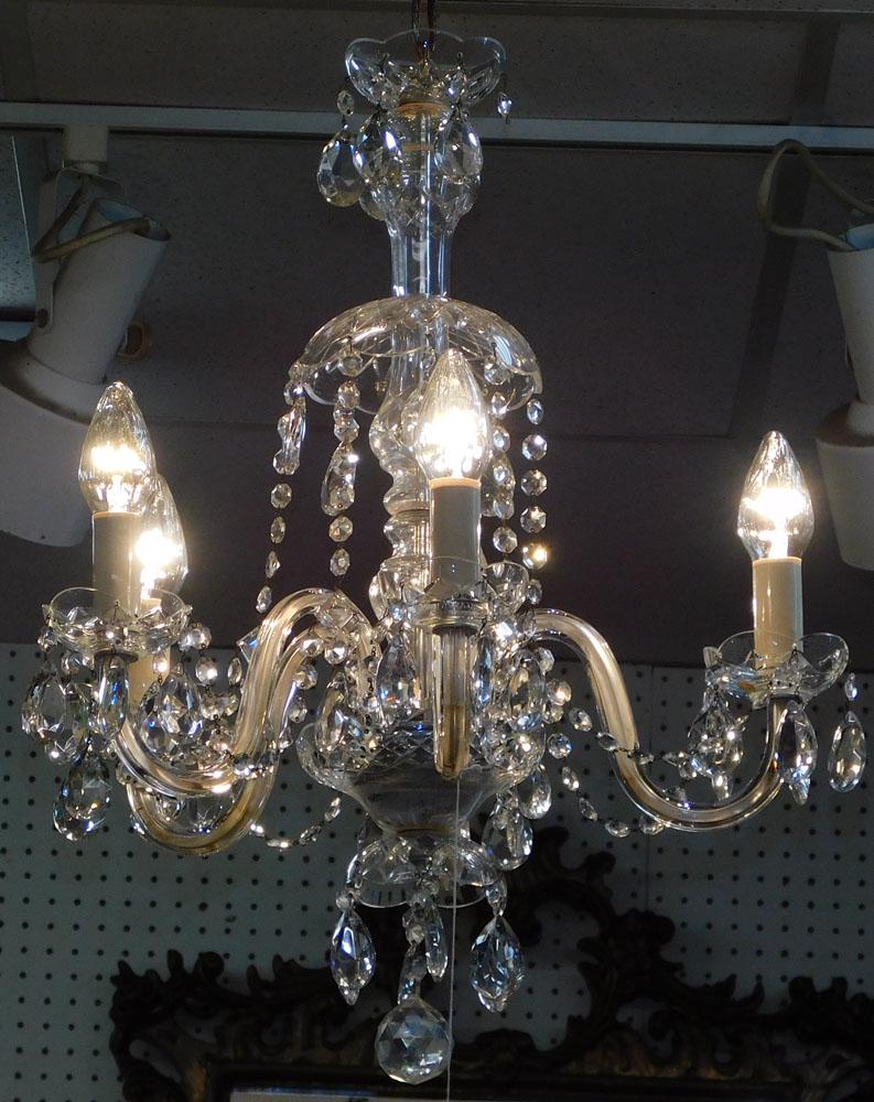 Crystal 5 Light Chandelier: Crystal 5 Light Chandelier. 22" H ALL DESCRIPTIONS AND ANY CONDITION STATEMENT GIVEN BY LANGSTON AUCTION GALLERY ARE STRICTLY OPINIONS AND LANGSTON'S SHALL HAVE NO RESPONSIBILITY FOR ERRORS OR OMISSIO