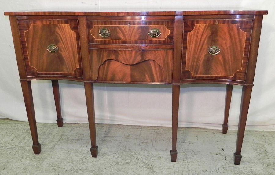 Inlaid mahogany serpentine front small side board: Inlaid mahogany serpentine front small side board from the Greenville estate. 54" long x 20 1/2" deep x 36" tall.