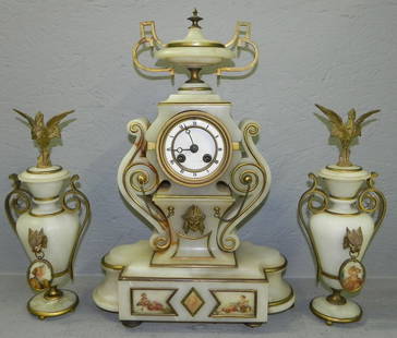French alabaster clock set with bronze trim.: French alabaster clock set with bronze trim.