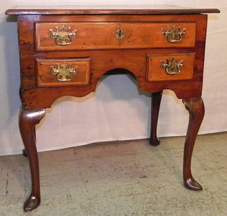 Yew wood 18th c QA slipper foot low boy.: Yew wood 18th century Queen Anne slipper foot low boy.