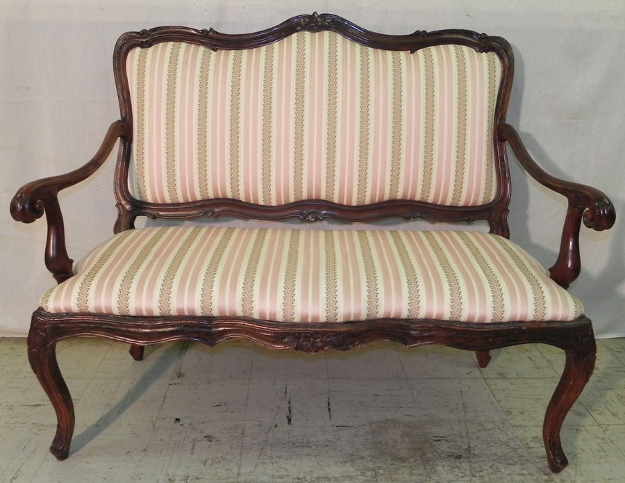 18th century French walnut settee.: 18th century French walnut settee. 49" long x 40" tall.