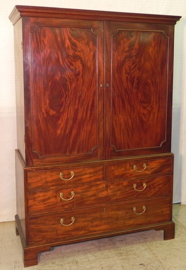 18th century flame mahogany linen press.: 18th century flame mahogany linen press. 48" wide x 22 1/2" deep x 6'1" tall.