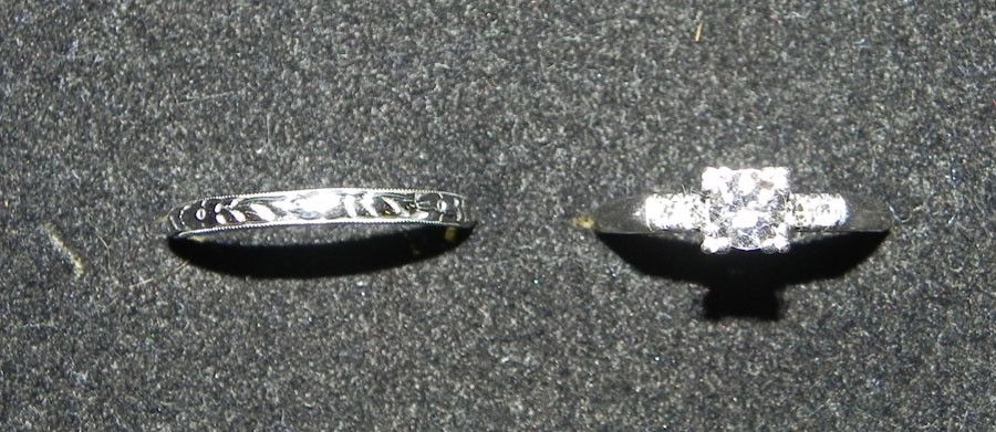 Platinum engagement ring & 18K wedding band: Ladies platinum engagement ring with .5 ct. diamond and an 18 kt. wedding band. Appraised value is $1400
