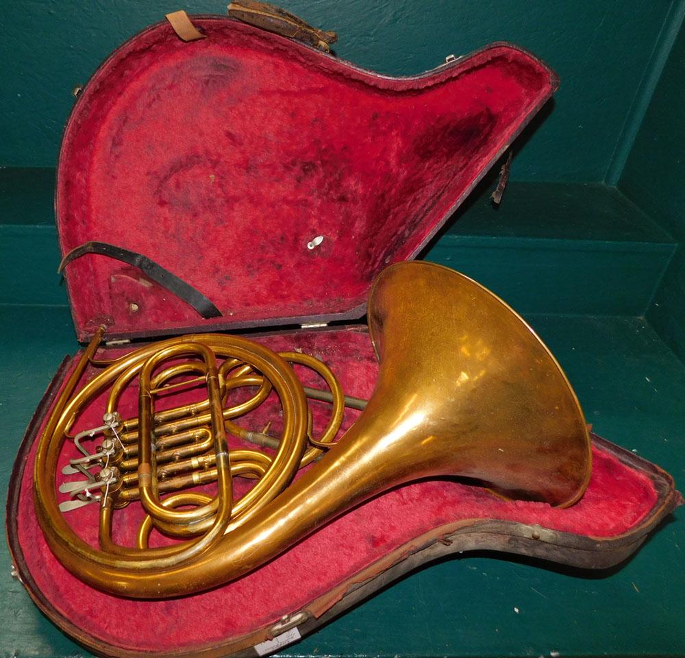 Cleveland Brass French Horn In Case: Cleveland Brass French Horn In Case . 27" W "ALL DESCRIPTIONS AND ANY CONDITION STATEMENT GIVEN BY LANGSTON AUCTION GALLERY ARE STRICTLY OPINIONS AND LANGSTON'S SHALL HAVE NO RESPONSIBILITY FOR ERRORS