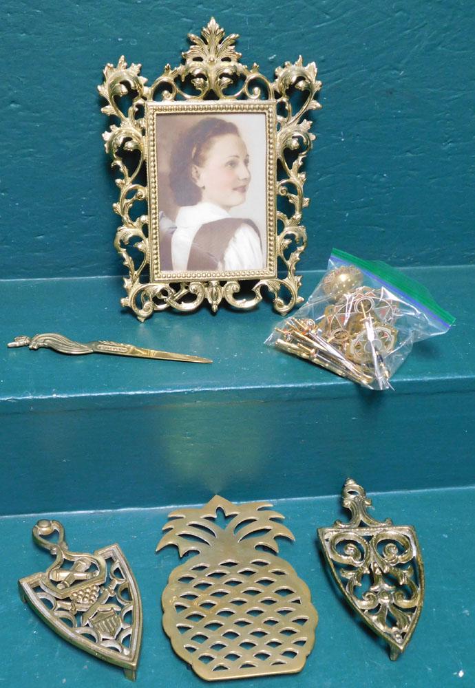 Lot Brass Picture Frame - Trivets: Lot Brass Picture Frame - Trivets. "ALL DESCRIPTIONS AND ANY CONDITION STATEMENT GIVEN BY LANGSTON AUCTION GALLERY ARE STRICTLY OPINIONS AND LANGSTON'S SHALL HAVE NO RESPONSIBILITY FOR ERRORS OR OMISS