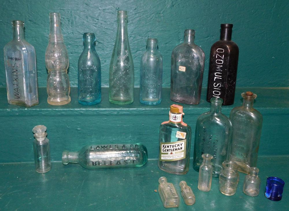 Lot Medicine Bottles: Lot Medicine Bottles. "ALL DESCRIPTIONS AND ANY CONDITION STATEMENT GIVEN BY LANGSTON AUCTION GALLERY ARE STRICTLY OPINIONS AND LANGSTON'S SHALL HAVE NO RESPONSIBILITY FOR ERRORS OR OMISSIONS. THE ABS