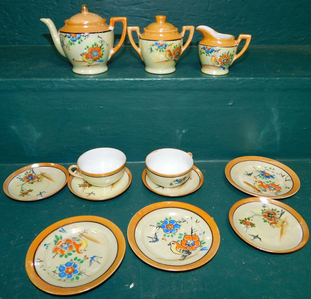 Childs Porcelain Tea Set: Childs Porcelain Tea Set. "ALL DESCRIPTIONS AND ANY CONDITION STATEMENT GIVEN BY LANGSTON AUCTION GALLERY ARE STRICTLY OPINIONS AND LANGSTON'S SHALL HAVE NO RESPONSIBILITY FOR ERRORS OR OMISSIONS. THE