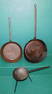 Three Wrought Iron Skillets