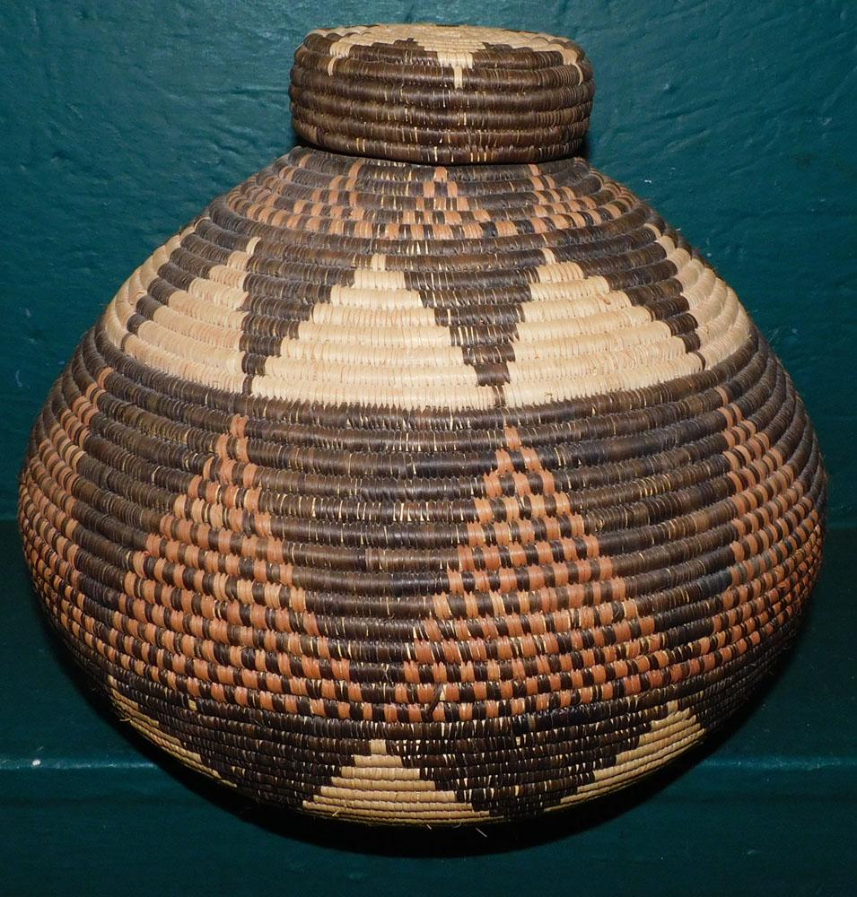 Woven Snake Charmers Basket: Woven Snake Charmers Basket. 11" H "ALL DESCRIPTIONS AND ANY CONDITION STATEMENT GIVEN BY LANGSTON AUCTION GALLERY ARE STRICTLY OPINIONS AND LANGSTON'S SHALL HAVE NO RESPONSIBILITY FOR ERRORS OR OMISS