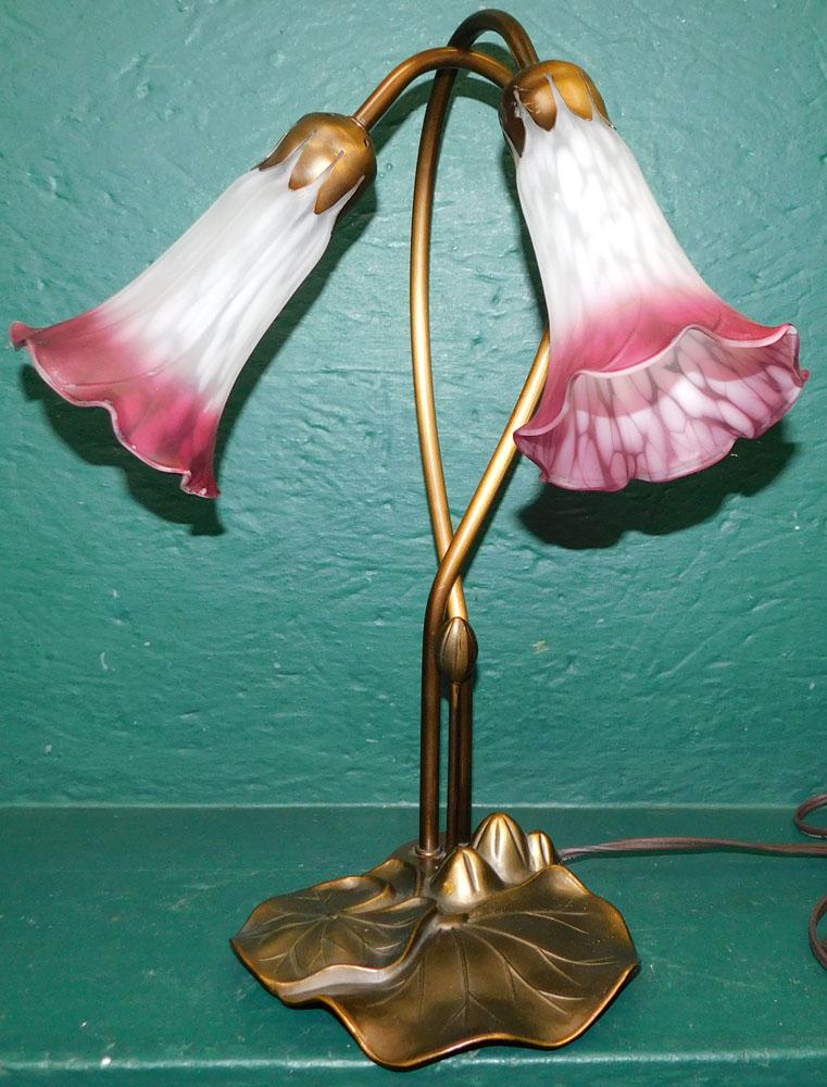 Water Lilly Glass Lamp: Water Lilly Glass Lamp. 16" H "ALL DESCRIPTIONS AND ANY CONDITION STATEMENT GIVEN BY LANGSTON AUCTION GALLERY ARE STRICTLY OPINIONS AND LANGSTON'S SHALL HAVE NO RESPONSIBILITY FOR ERRORS OR OMISSIONS.