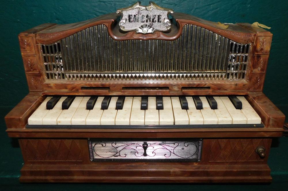 Emenee Childs Organ: Emenee Childs Organ. 15" W 7" D 10" H "ALL DESCRIPTIONS AND ANY CONDITION STATEMENT GIVEN BY LANGSTON AUCTION GALLERY ARE STRICTLY OPINIONS AND LANGSTON'S SHALL HAVE NO RESPONSIBILITY FOR ERRORS OR OM