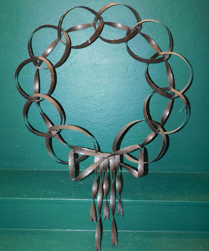 Metal Wall Wreath: Metal Wall Wreath. 27 3/4" x 37 3/4" "ALL DESCRIPTIONS AND ANY CONDITION STATEMENT GIVEN BY LANGSTON AUCTION GALLERY ARE STRICTLY OPINIONS AND LANGSTON'S SHALL HAVE NO RESPONSIBILITY FOR ERRORS OR OMI