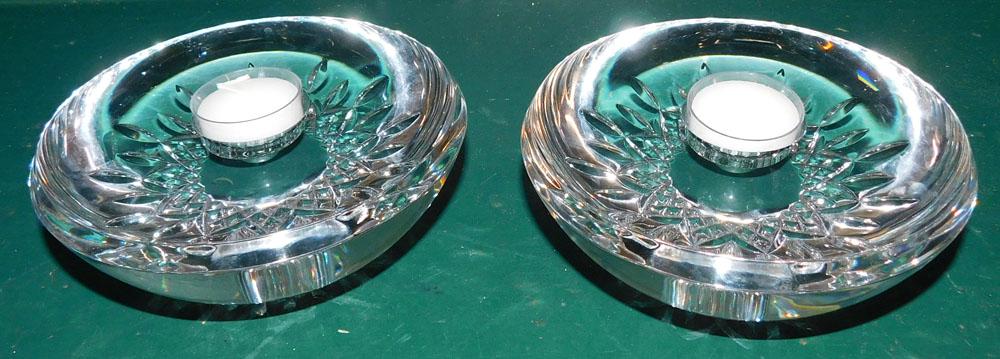 Pair of Heavy Waterford Crystal Candle Holders: Pair of Heavy Waterford Crystal Candle Holders. 6" Dia. ALL DESCRIPTIONS AND ANY CONDITION STATEMENT GIVEN BY LANGSTON AUCTION GALLERY ARE STRICTLY OPINIONS AND LANGSTON'S SHALL HAVE NO RESPONSIBILITY