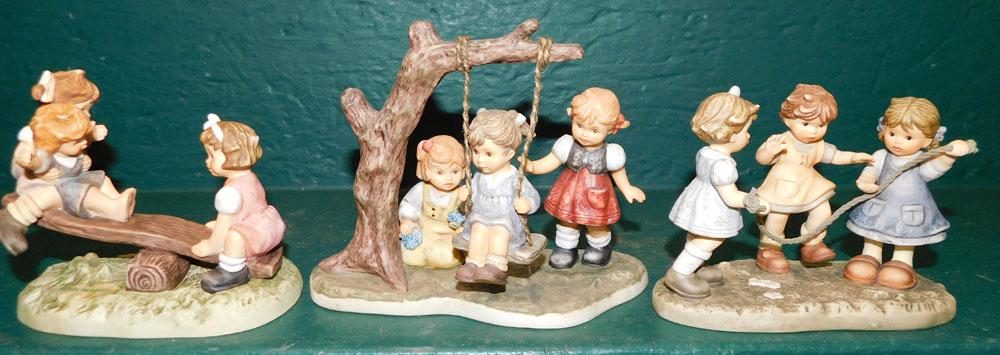 3 Goebel Figurines: 3 Goebel Figurines . ALL DESCRIPTIONS AND ANY CONDITION STATEMENT GIVEN BY LANGSTON AUCTION GALLERY ARE STRICTLY OPINIONS AND LANGSTON'S SHALL HAVE NO RESPONSIBILITY FOR ERRORS OR OMISSIONS. THE ABSEN