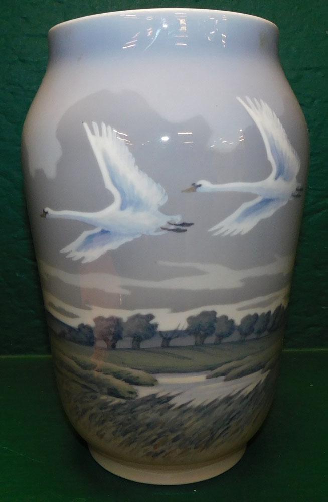 Porcelain Vase by Royal Copenhagen with Crane Motif: Porcelain Vase by Royal Copenhagen with Crane Motif . 10" H ALL DESCRIPTIONS AND ANY CONDITION STATEMENT GIVEN BY LANGSTON AUCTION GALLERY ARE STRICTLY OPINIONS AND LANGSTON'S SHALL HAVE NO RESPONSIBI