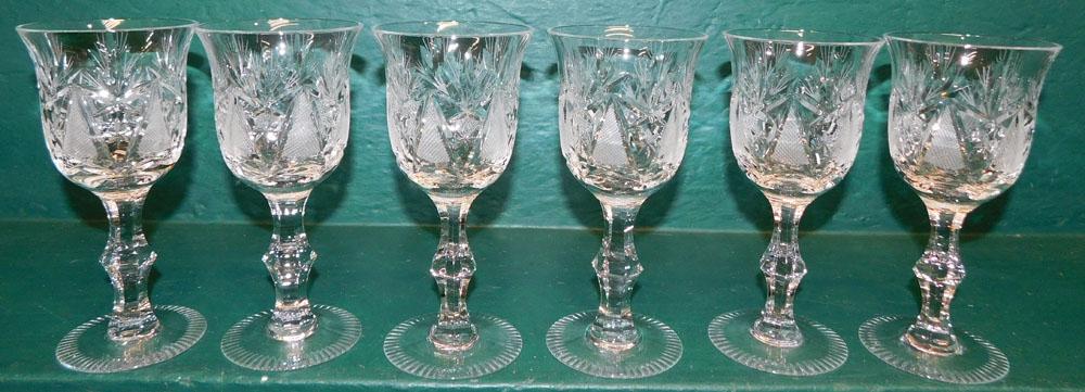 Set of 6 Cut Glass Wine Glasses: Set of 6 Cut Glass Wine Glasses . 7 1/4" H ALL DESCRIPTIONS AND ANY CONDITION STATEMENT GIVEN BY LANGSTON AUCTION GALLERY ARE STRICTLY OPINIONS AND LANGSTON'S SHALL HAVE NO RESPONSIBILITY FOR ERRORS O
