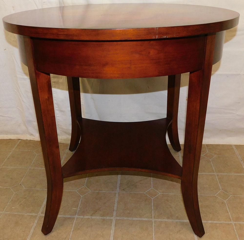 Mahogany & Elmwood Center Table: Mahogany & Elmwood Center Table. 30" Dia 29" H ALL DESCRIPTIONS AND ANY CONDITION STATEMENT GIVEN BY LANGSTON AUCTION GALLERY ARE STRICTLY OPINIONS AND LANGSTON'S SHALL HAVE NO RESPONSIBILITY FOR ERRO