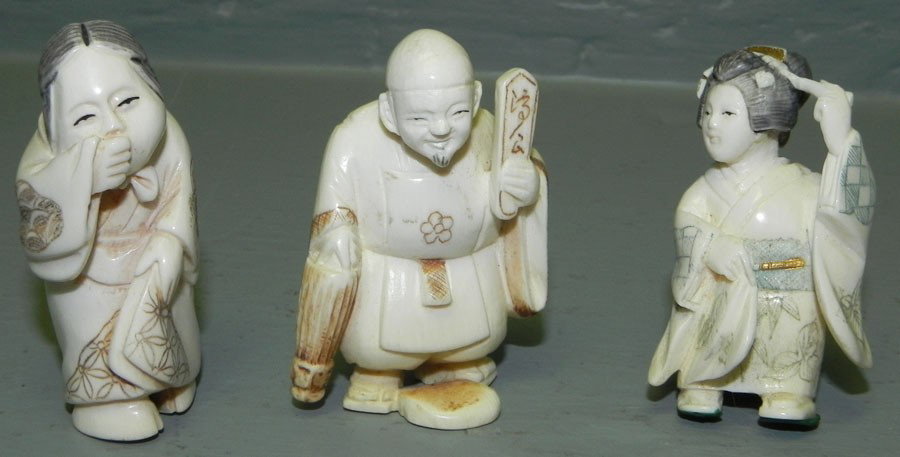 2 carved ivory or bone netsukes and figurine.: (2) carved ivory or bone netsukes and carved ivory or bone figurine. 2" to 2 1/4" tall.