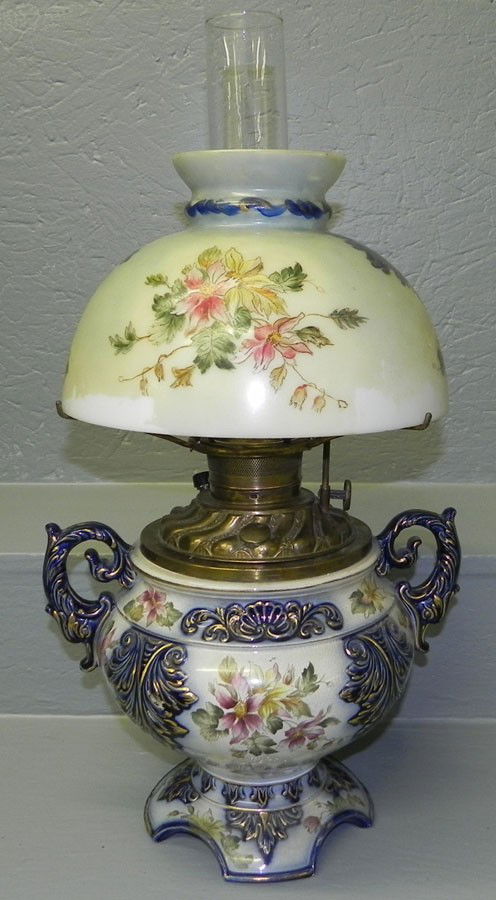 Gone with the Wind type lamp with brass font.: Gone with the Wind type lamp with brass font. 21 1/4" tall.